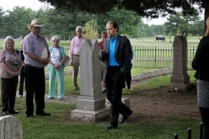 Eric Jacobson speaking in cemetery