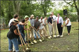 leaders and citizens break ground