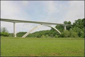 The Natchez Trace Parkway Bridge is a concrete double arch bridge located in Williamson County, Tennessee,