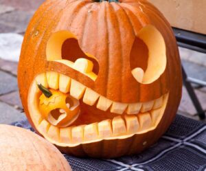 Carved pumpkins, halloween decor for neighborhood Halloween costume contests fun for all ages.