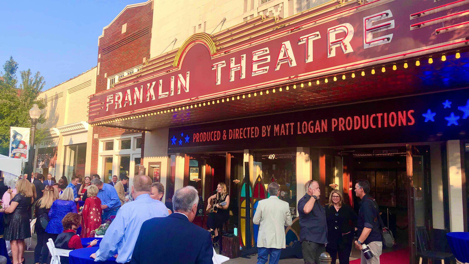 People in front of The Franklin Theatre in Downtown Franklin, TN.