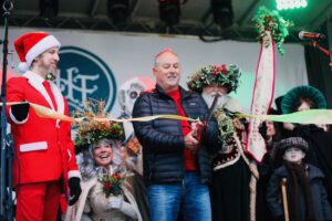 David Hopkins performs the ribbon cutting ceremony at Dickens of a Christmas in downtown Franklin, Tennessee.