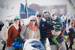 Family enjoying the festivities in downtown Franklin, Tenn at Dickens of a Christmas.