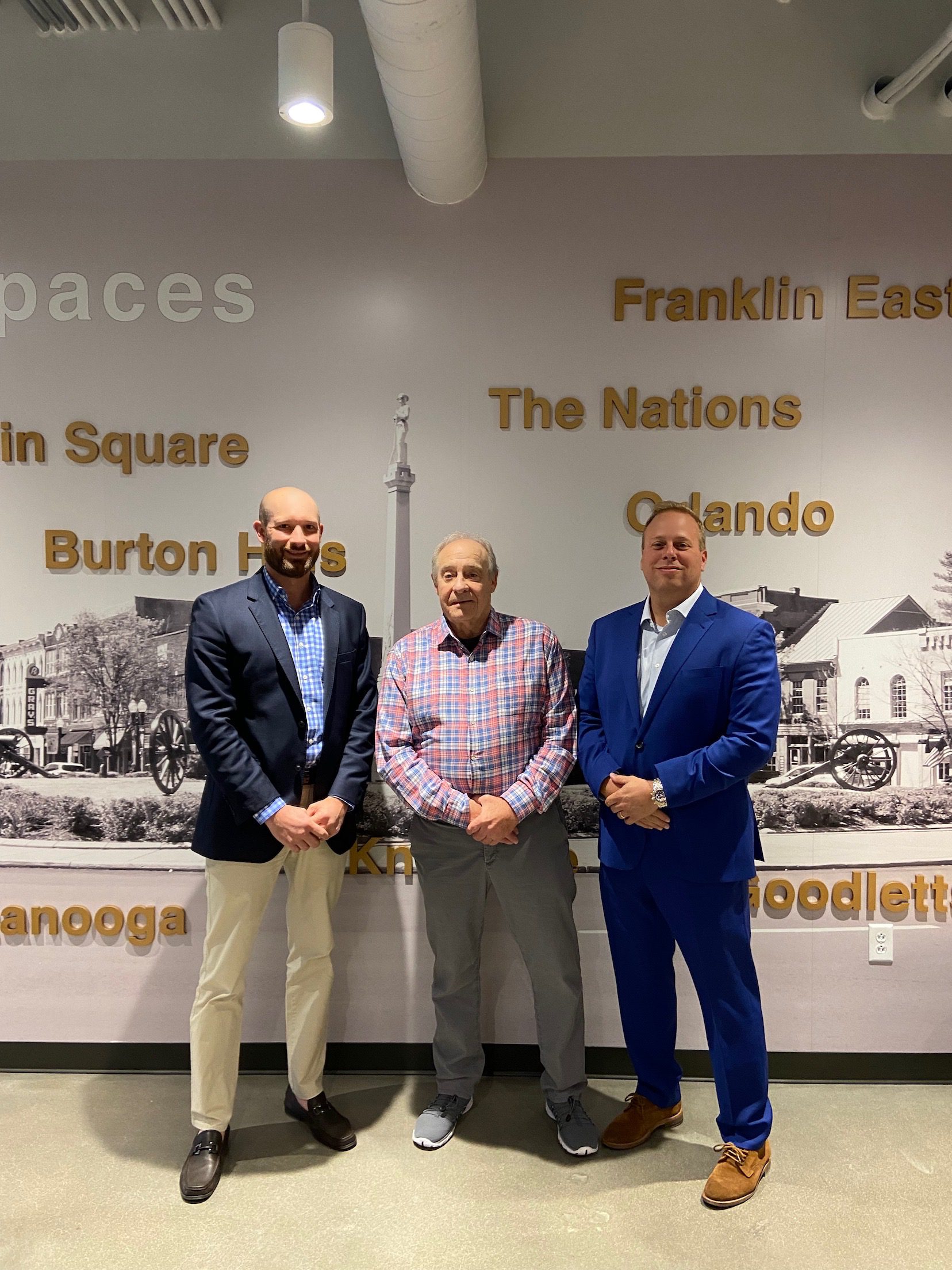 Bucky Ingram and Preston Ingram (owners of the 99 E. Main St. building) Jon Pirtle (president and CEO of e|spaces).