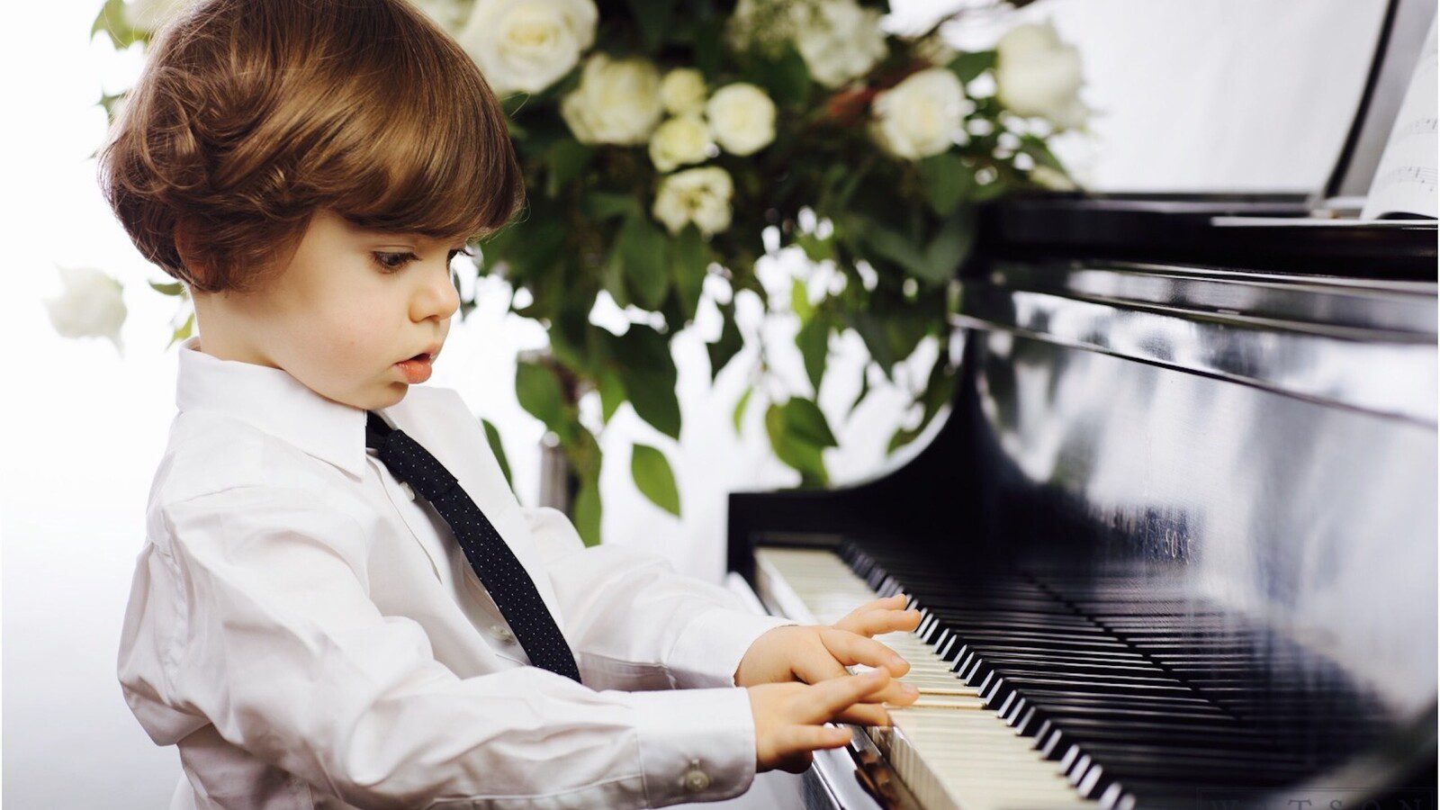 Autumn Artist Interactive - Boy playing the piano.