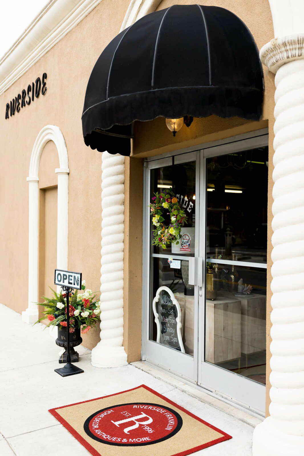 Entrance to Riverside Franklin store in downtown Franklin, they offer unique furniture, lighting, home accessories, textiles, and vintage finds.