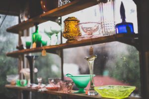 Antique store in Williamson County, Tennessee has antiques displayed on a shelf.