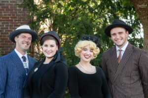 Cast for Guys and Dolls show in downtown Franklin at Pull-Tight Players Theatre, Photo l. to r.: Riley Bowers (Sky Masterson), Stephanie Jones (Sara Brown), Lauren McGill (Miss Adelaide), Elijah Bell (Nathan Detroit) / Photo credit: ThreeWishes Photography.