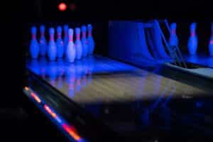 Bowling pins at a bowling alley in Franklin, Tennessee, Franklin Family Entertainment Center offers 24 bowling lanes, 6 lanes of mini-bowling, an arcade, 3 billiard tables, and a full-service bar and grill.