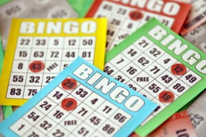 Bingo-and-Bagels-Brentwood-TN-Library, Many colorful bingo boards or playing cards for winning chips.