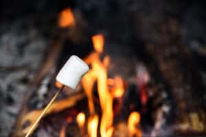 Marshmallow-Hikes-Brentwood-TN_Owls-Hill, Ready to roast marshmallow on wooden stick near camp fire.