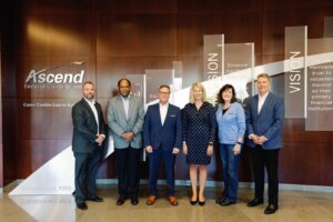 From left to right, Ascend president and CEO Matt Jernigan, board member Anthony Taylor, board chairman Mark Rigney, former Ascend president and CEO Caren Gabriel, board vice chairman Janet Marshall and board treasurer Andy Flatt.Ascend Federal Credit Union Names Corporate Headquarters Building in Honor of Caren Gabriel. Photo credit: Ascend Federal Credit Union.