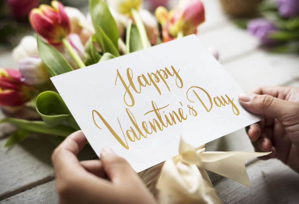Flowers with happy valentines day card.