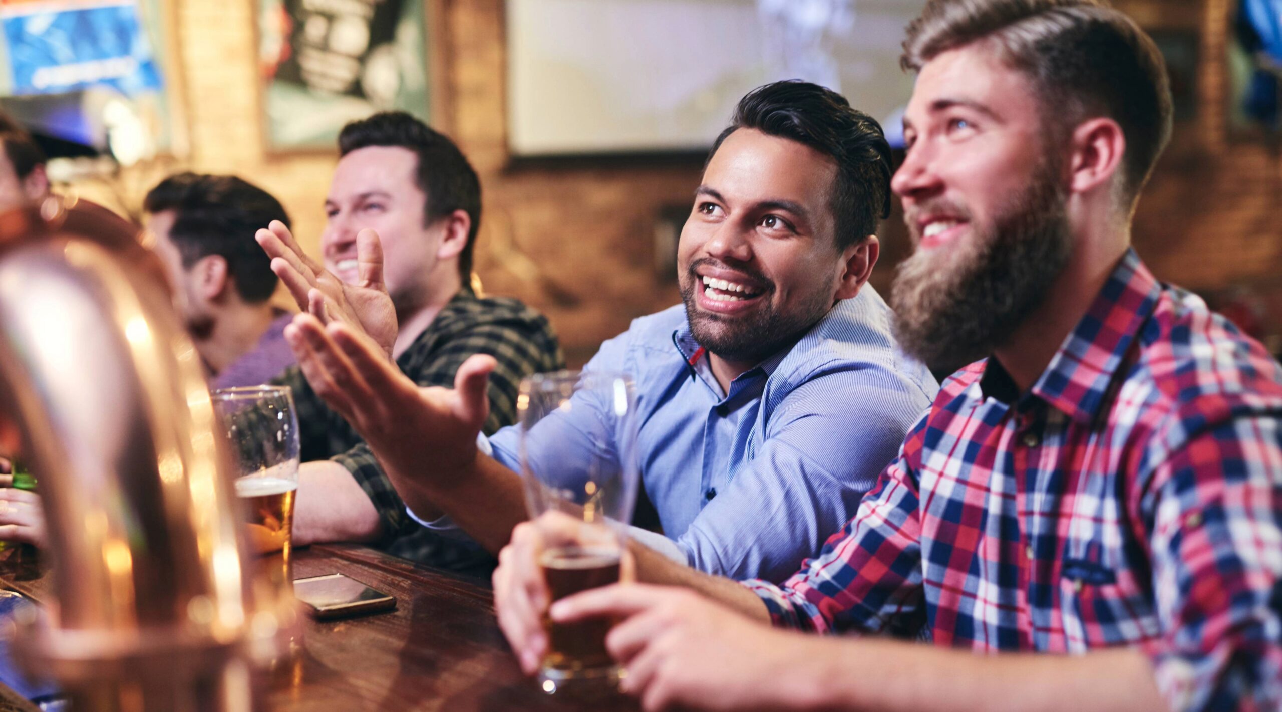 Super bowl in Franklin TN , men watching the game at a sport bar