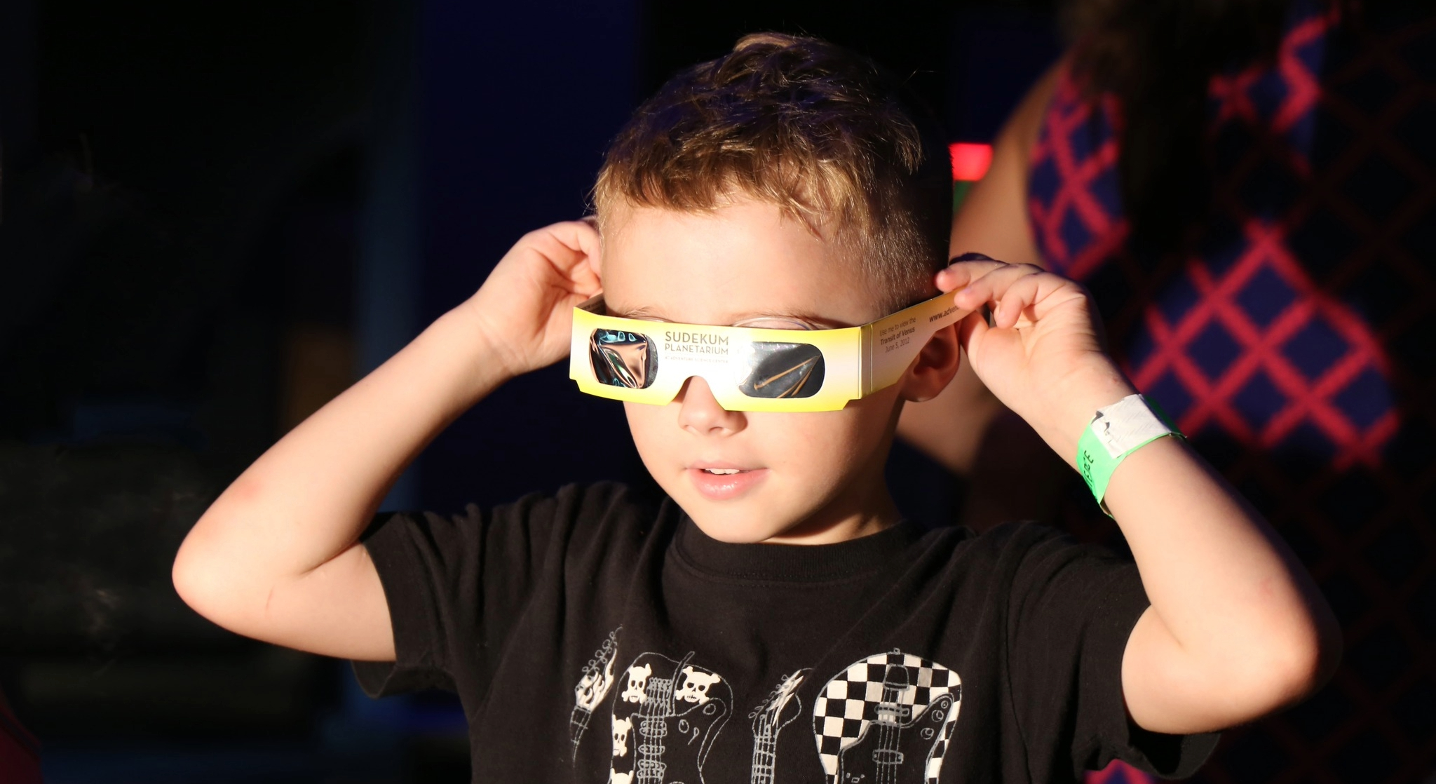 Child with eclipse glasses at Dyer Observatory in Brentwood, Tennessee.