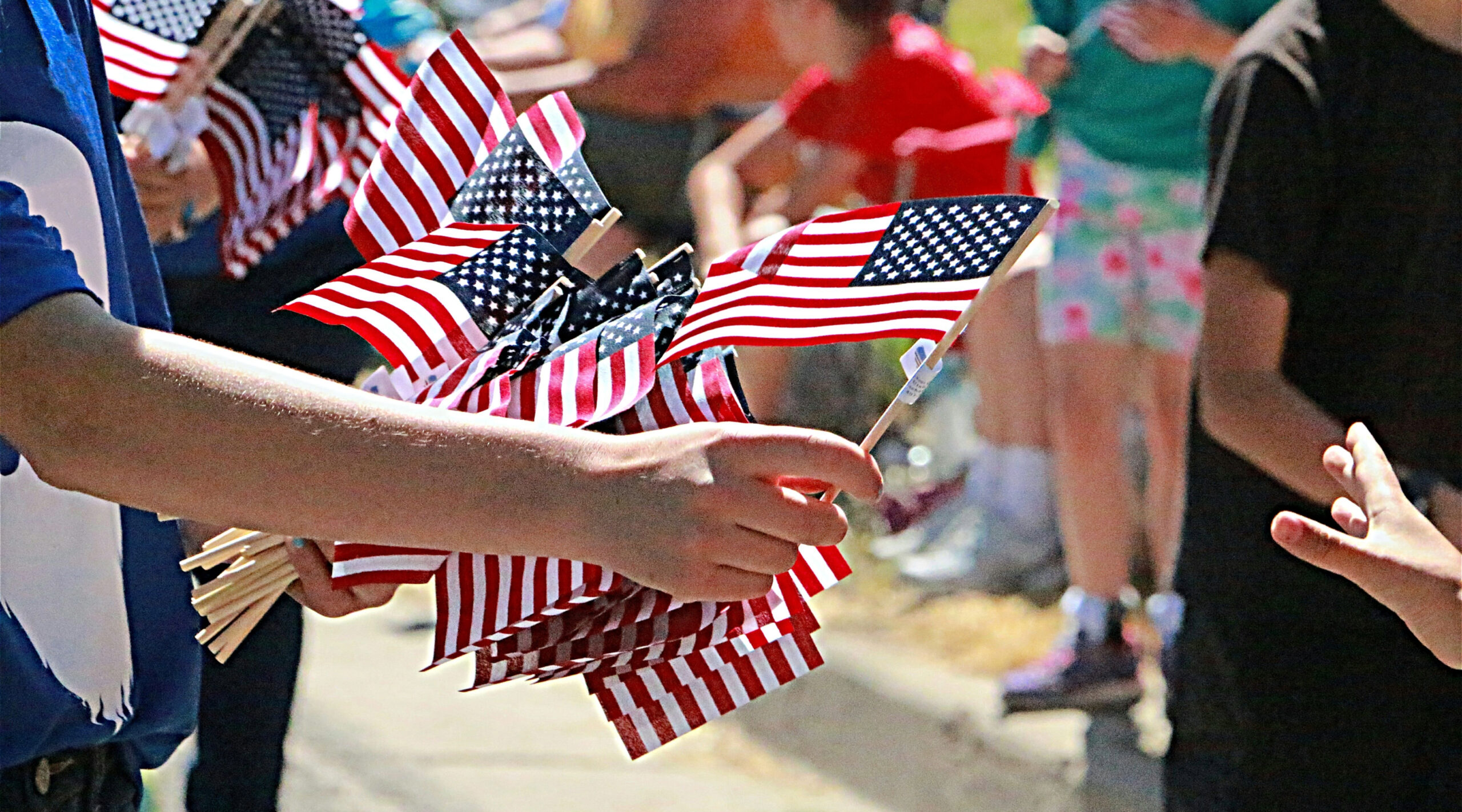 passing out flags on Memorial Day
