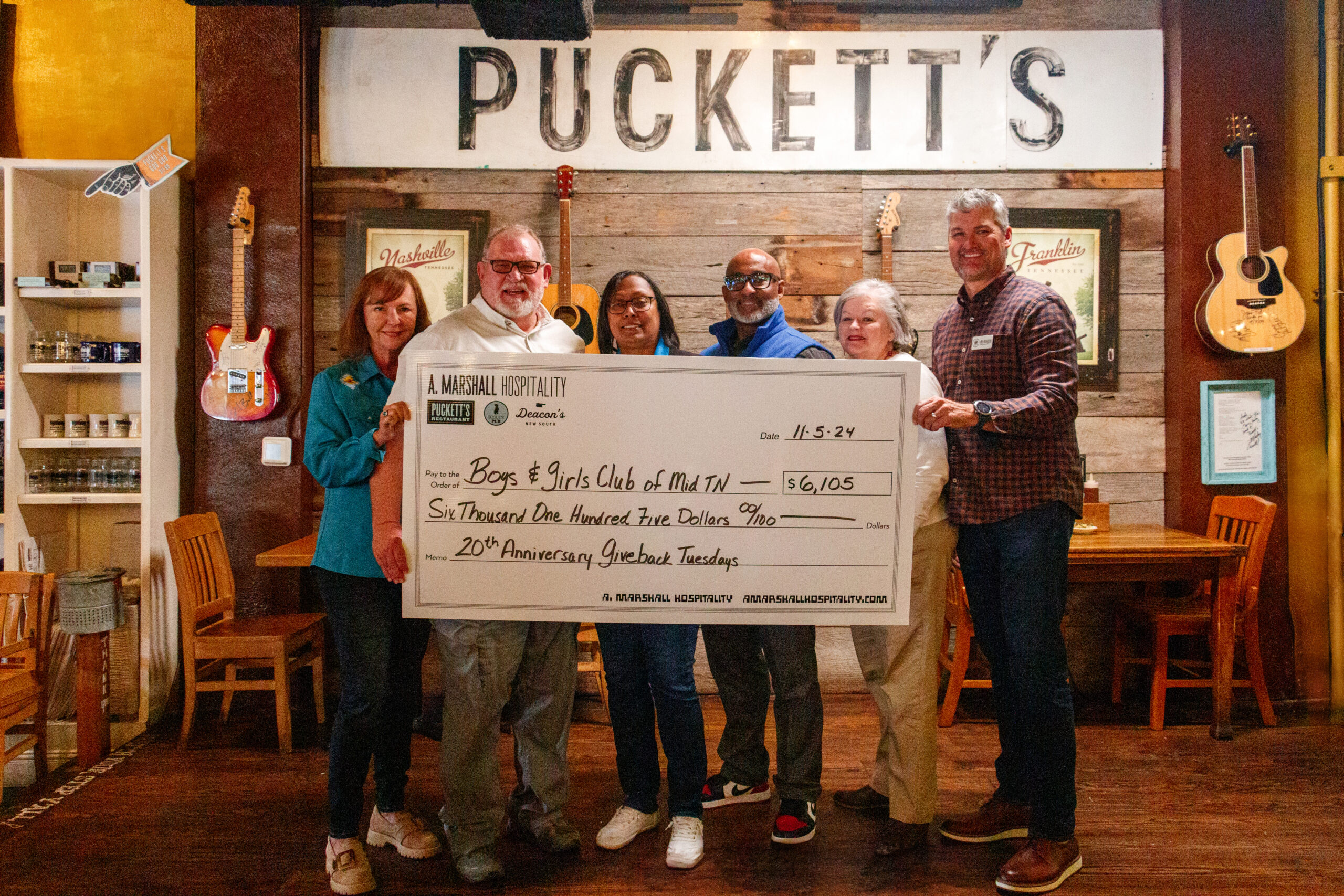 Puckett's Franklin x Boys & Girls Club Check Presentation.