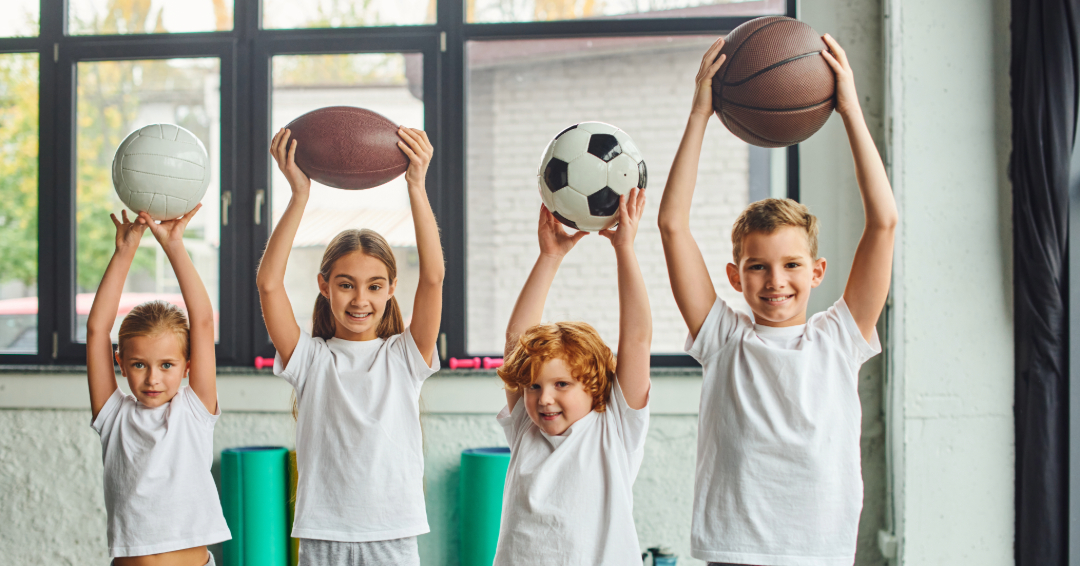 Kids Holding various sport balls