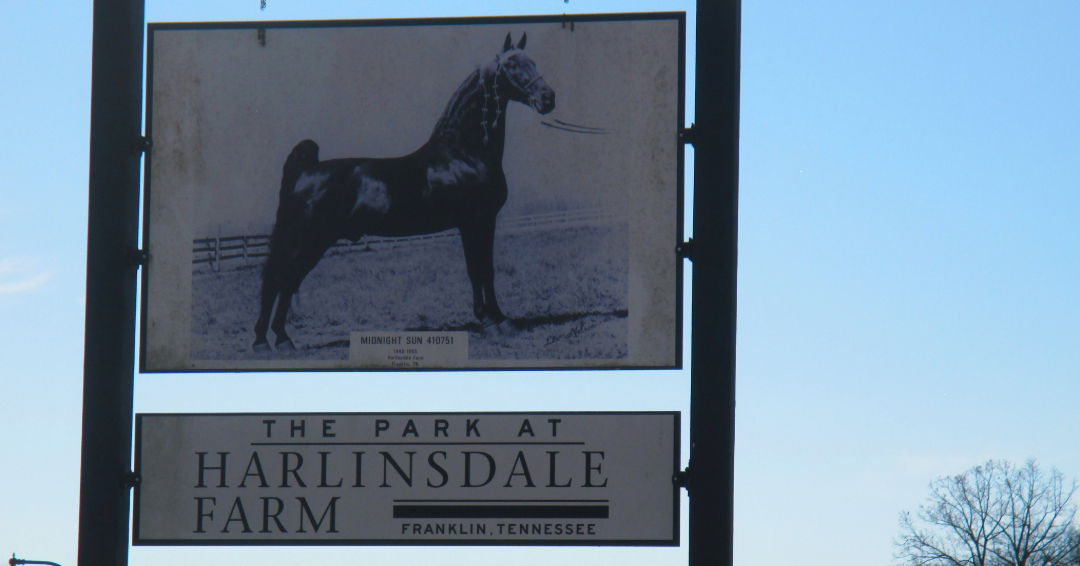 The Park at Harlinsdale Farm sign in Franklin, Tennessee, featuring Midnight Sun.