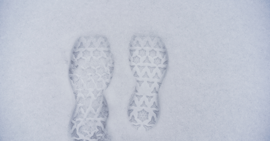 One set of footprints in the snow, Williamson County, TN winter safety tips.