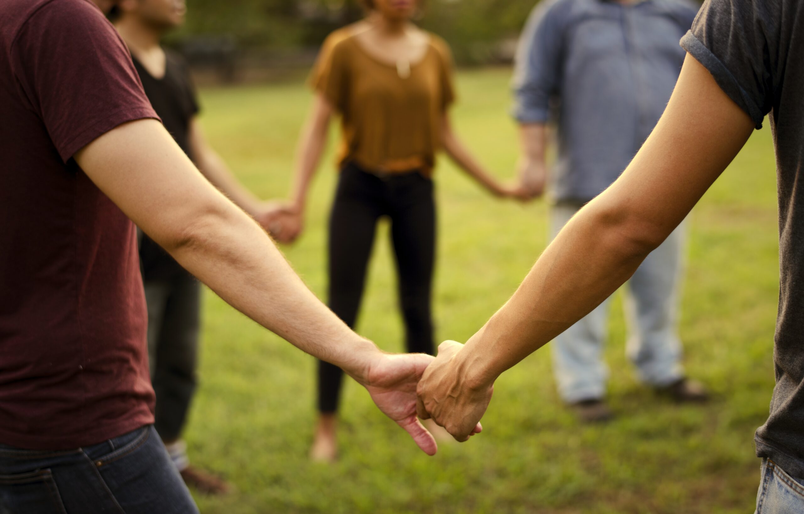 Group of people holding hands, find volunteer opportunities in Franklin, Brentwood and Williamson County, TN., on FranklinIs.