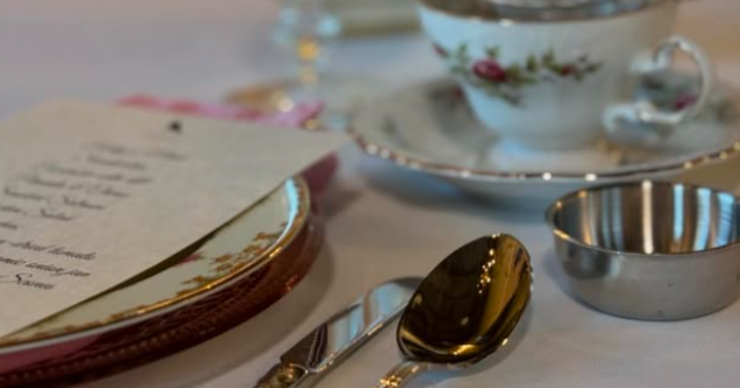 Place setting for a High Tea party at Glass Sparrow's Nest tea room in Franklin, TN, enjoy an assortment of coffee, tea, desserts, sandwiches, salads, quiches, and casseroles.