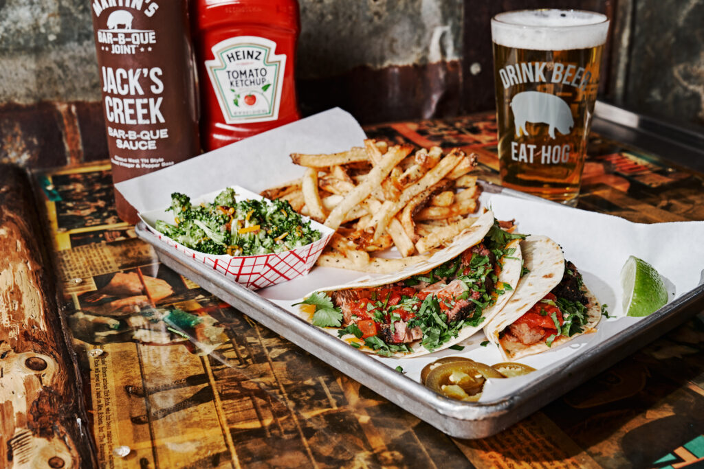 Martin's Bar-B-Que Joint Brisket Tacos, Broccoli Salad, and French Fries.