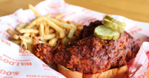 Waldo's Chicken and Beer in TN: Nashville Hot Chicken basket with pickles and fries.