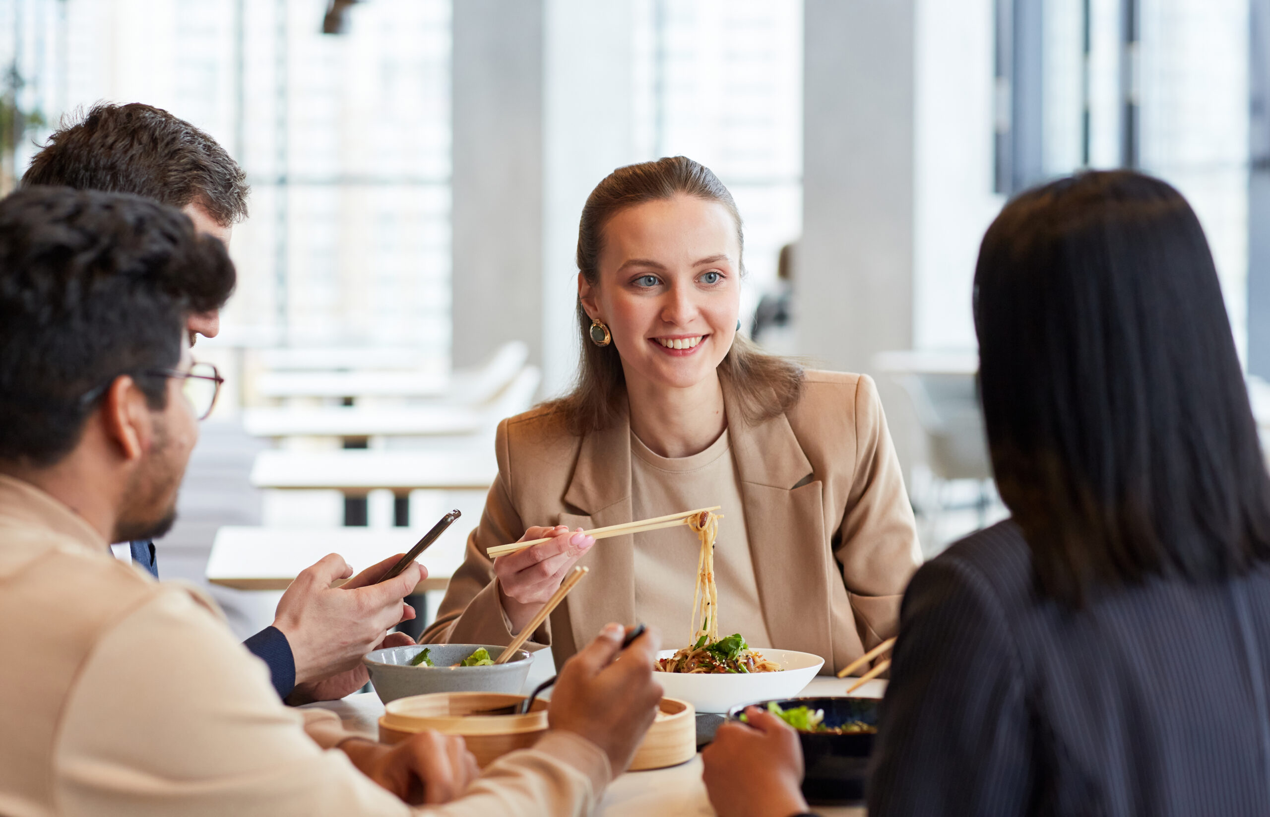 A group of colleagues has a business lunch in Franklin and Brentwood, Tennessee.