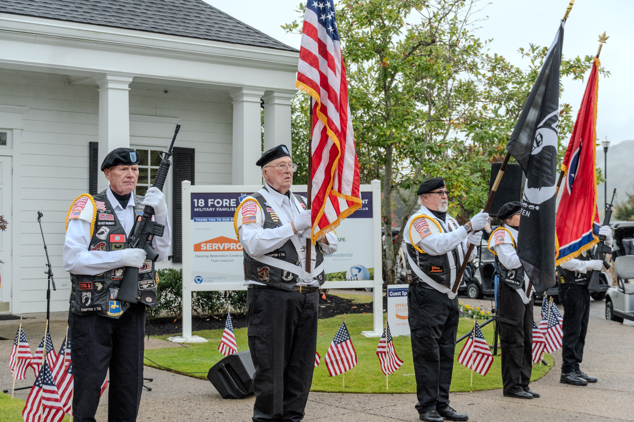 Members of a local veterans honor guard present the colors at the 12th annual 18 FORE MILITARY FAMILIES Golf Tournament at The Governors Club in Brentwood, Tenn.