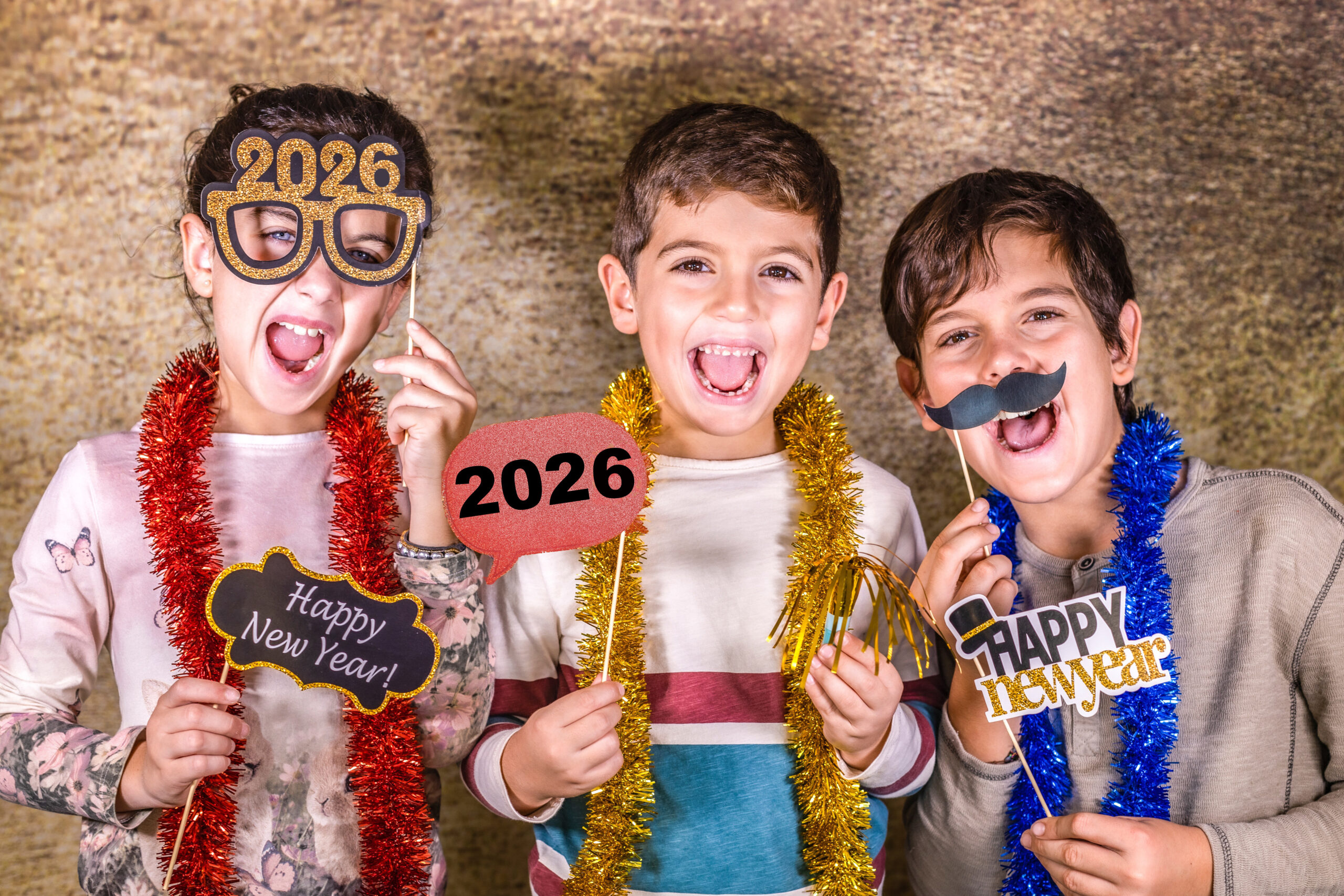 Three kids celebrating New Years Eve. 2026 in Franklin, TN.