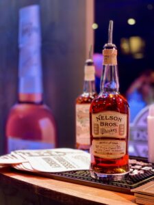 Whiskey Warmer Festival in Franklin, TN, offers whiskey distillers tastings, chef's tastings, whiskey and cocktail samples, live music, a cigar lounge, whiskey education, photo ops, and more.