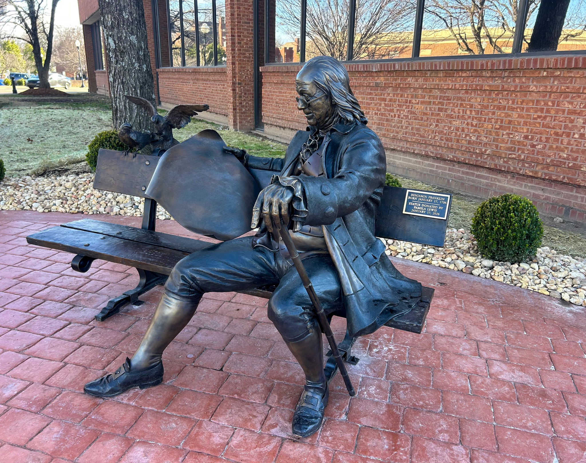 Ben on the Bench statue in downtown Franklin, Tennessee, showing a bronze Benjamin Franklin seated on a bench outside the Williamson County Archives and Museum.