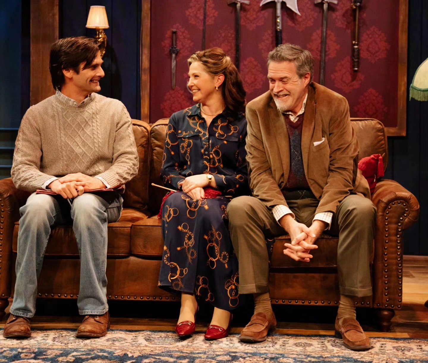 Valentine’s Day at The Factory at Franklin pairing dinner with a show, featuring a scene from Deathtrap at Turner Theater presented by Studio Tenn, with actors seated on stage during the suspenseful comedy-thriller.