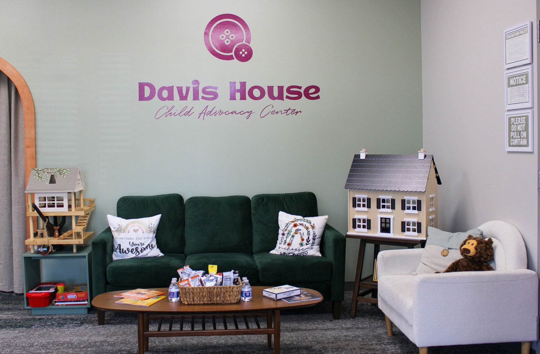 Davis House Child Advocacy Center Franklin TN, showing the interior of the center with couch and children's toys.