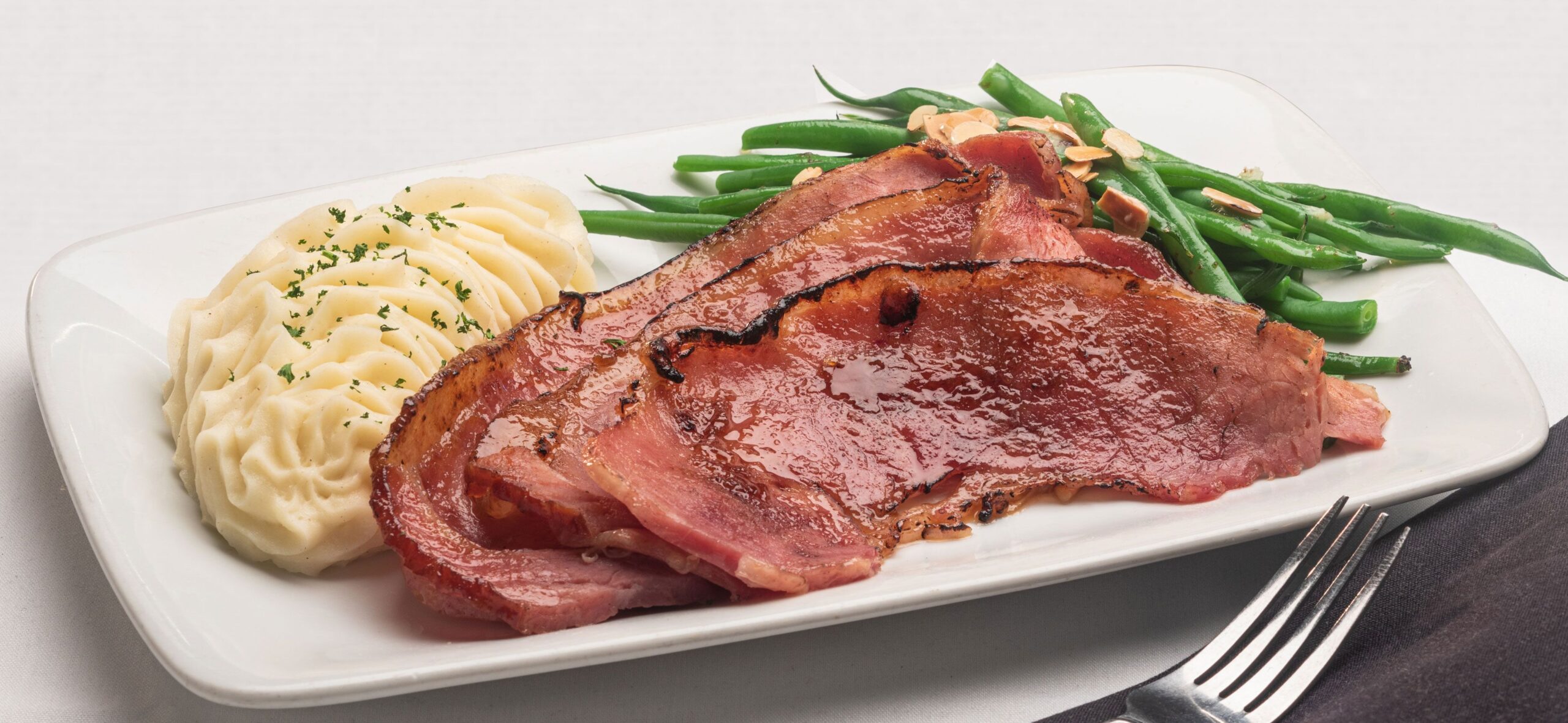 Perry's Steakhouse & Grille Franklin Easter Dining Specials_Individual Easter Ham Meal.