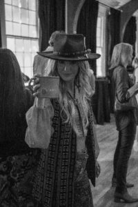 Lainey Wilson holding a Bison Union Coffee mug with Bison Union Coffee. Image courtesy of Bison Union Co.