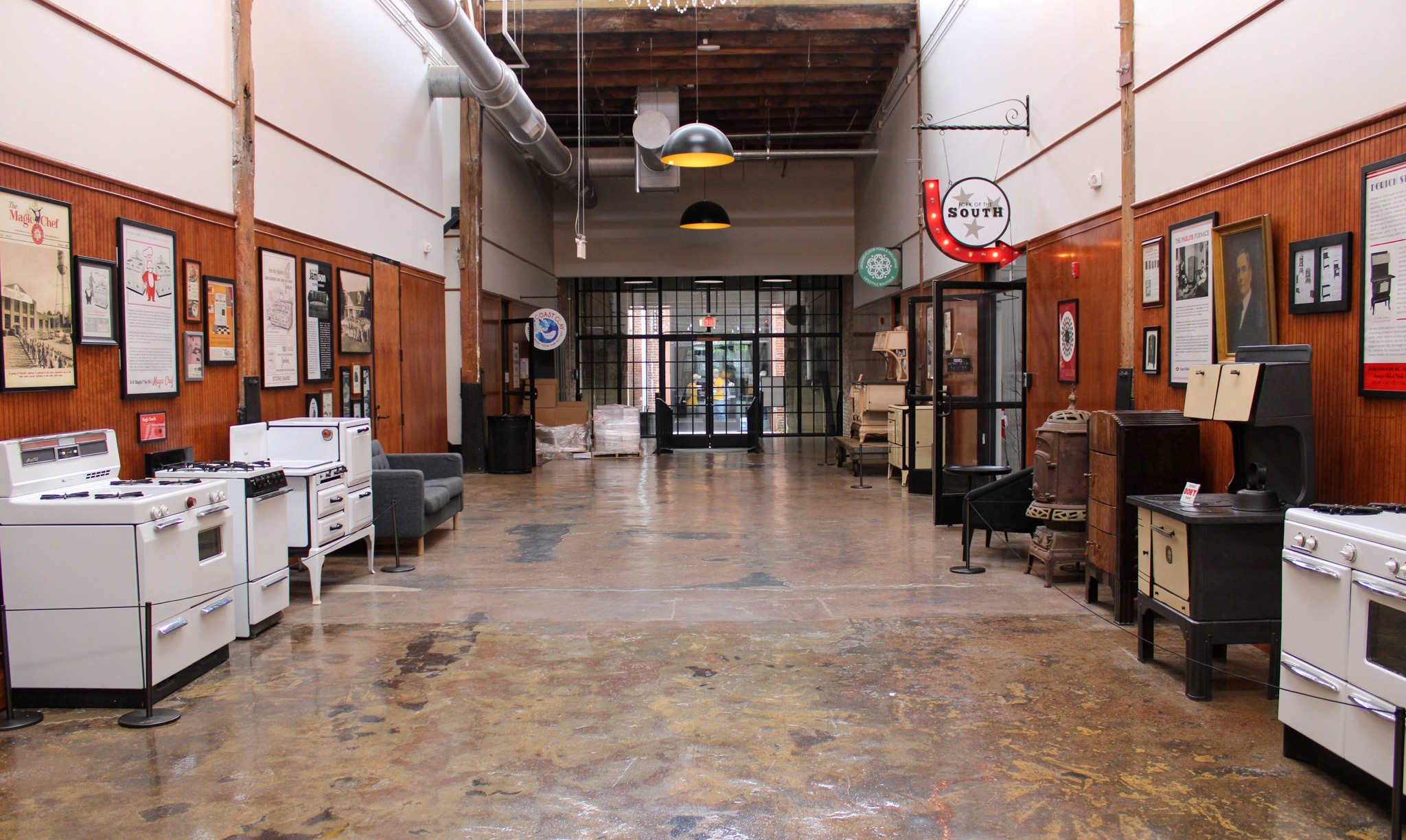 Interior of The Factory Museum in Building 8 at The Factory at Franklin TN with historic stoves and exhibits.