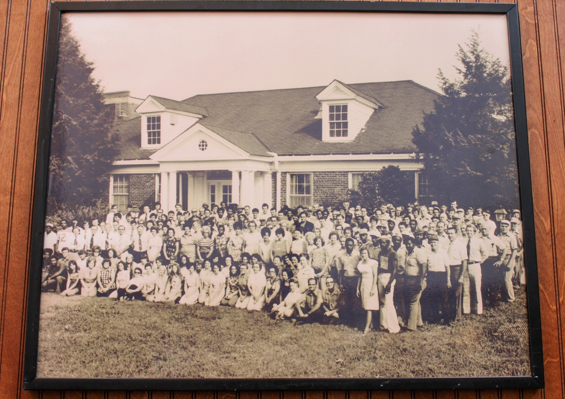Historic group photo of factory workers displayed at The Factory Museum in Franklin, TN.