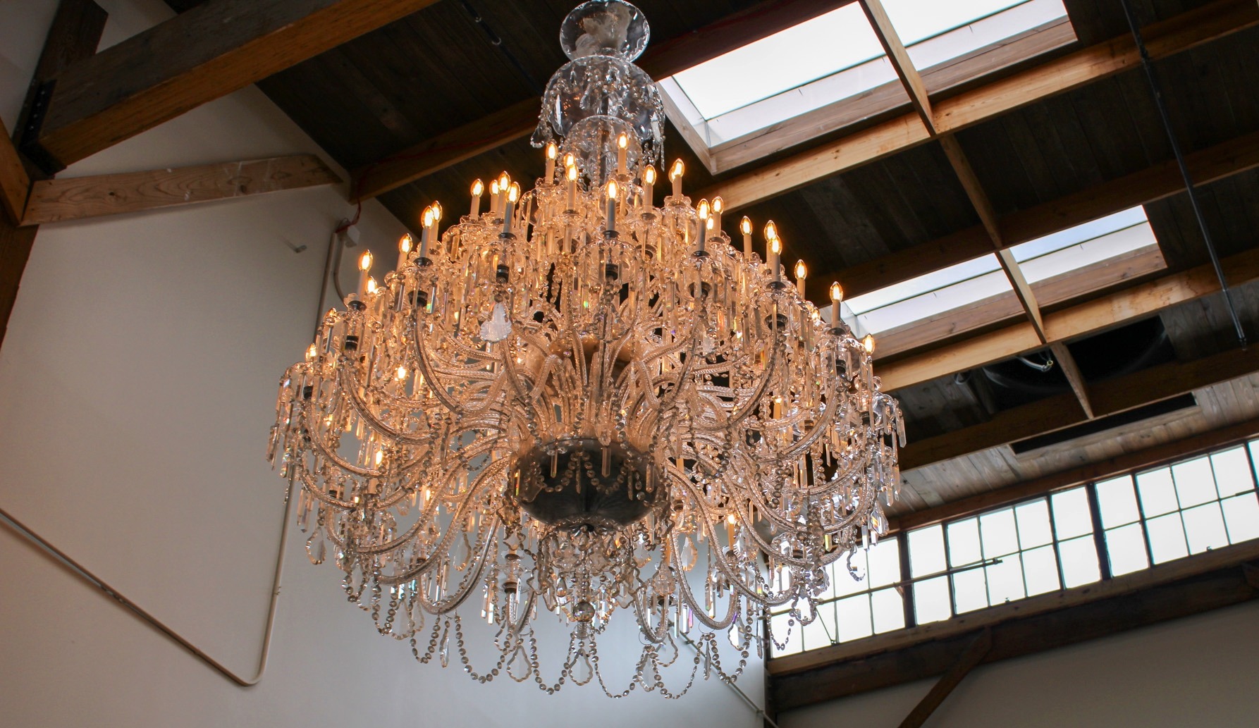 Restored crystal chandelier hanging in Building 8 at The Factory Museum in Franklin, TN, inside The Factory at Franklin.
