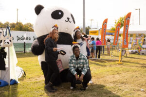 Panda Fest Nashville, TN, group of friends takes a photo with a panda