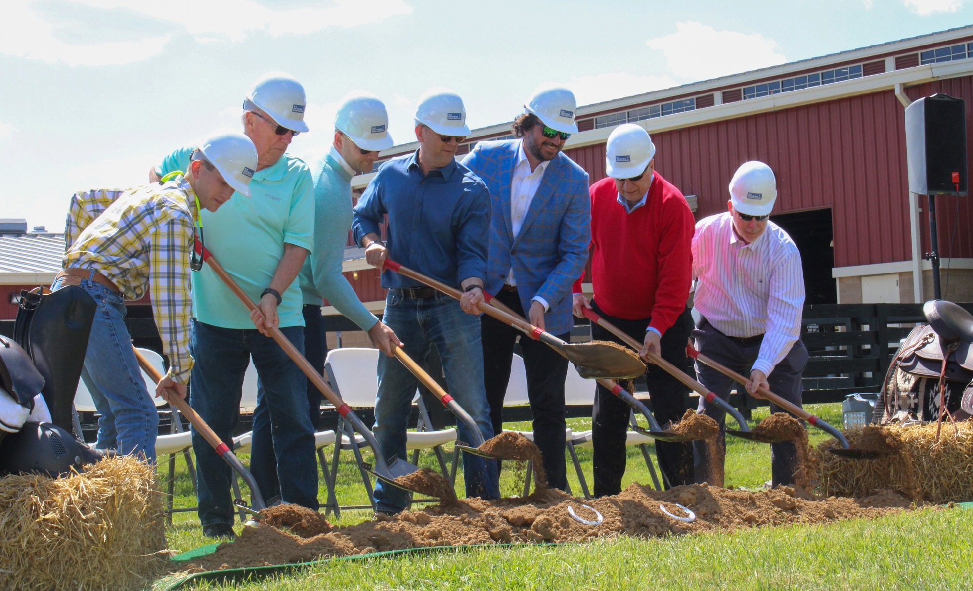 community leaders breaking ground with shovels at Saddle Up expansion in Franklin TN