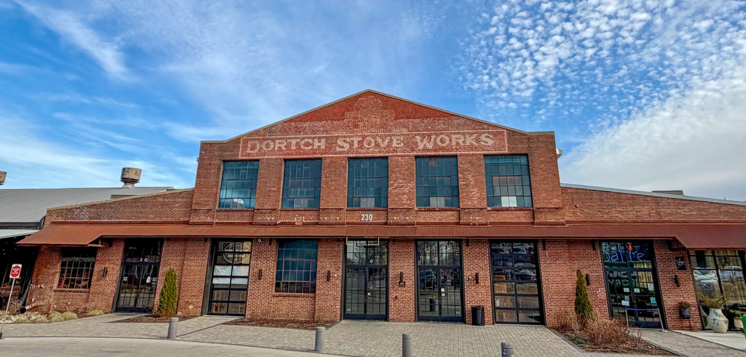 The Factory at Franklin, Franklin, Tennessee, historic brick exterior of renovated stove factory complex featuring storefronts, courtyards, and gathering spaces