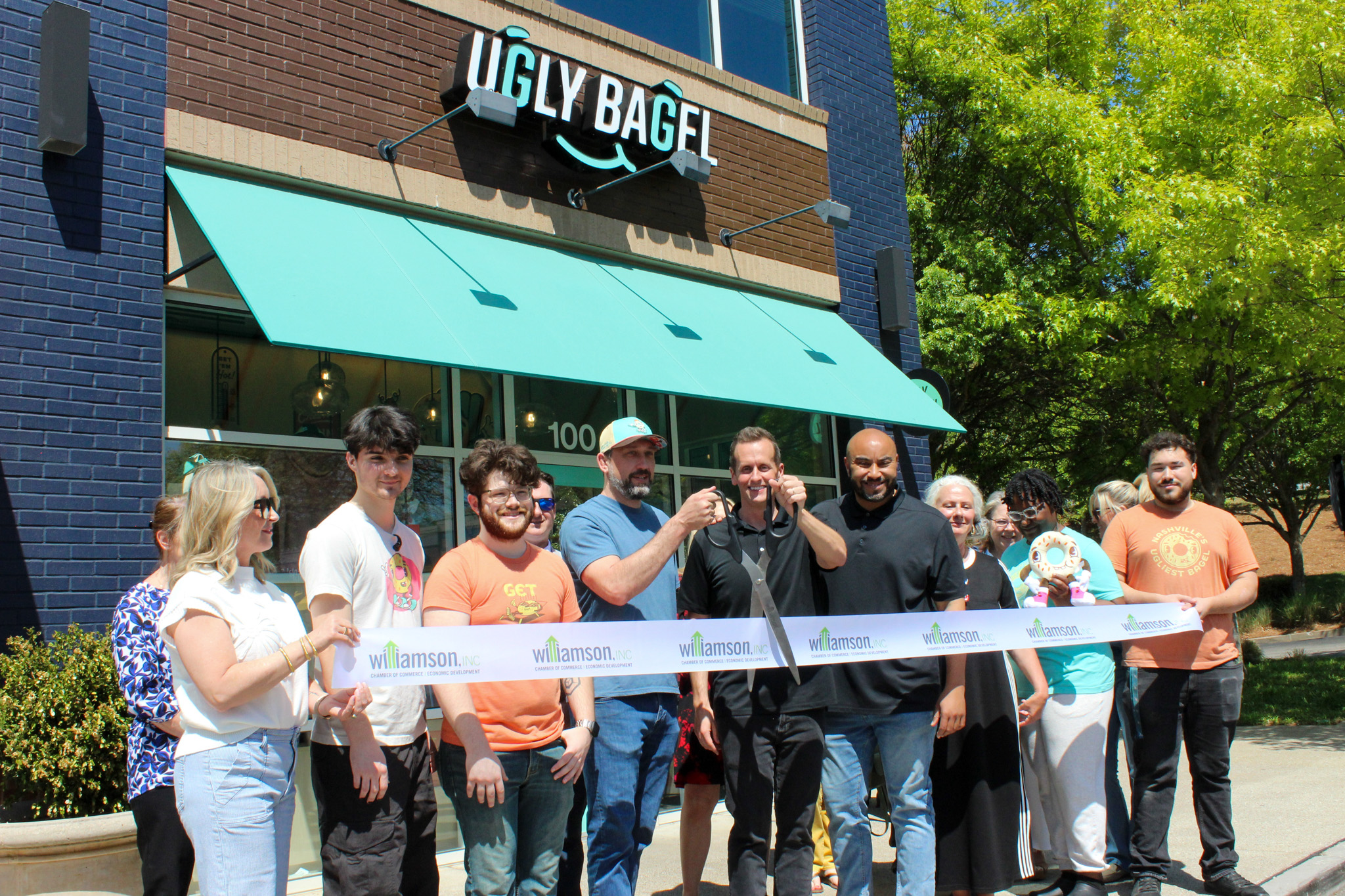Ugly Bagel ribbon cutting ceremony Franklin, TN, pictured are co-founders Jake Strang (left) and Jeff Crabiel (right)