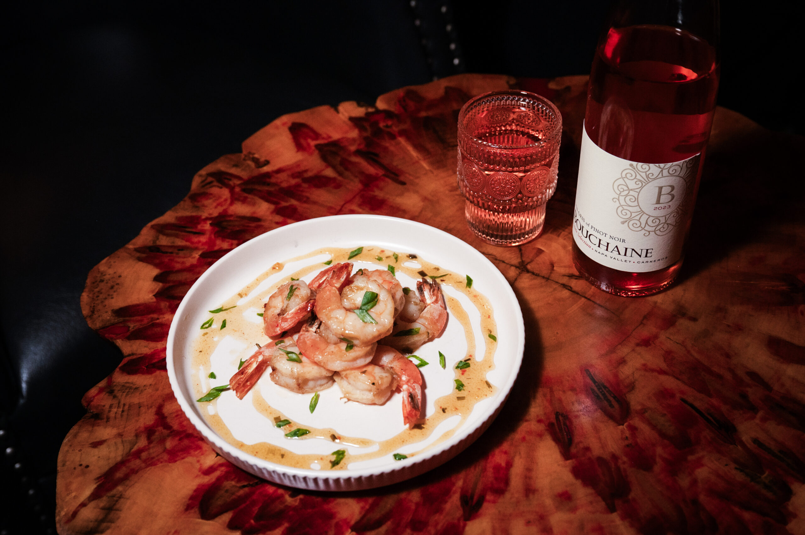 Amendment XVIII Cocktail Club, a cocktail lounge in historic downtown Franklin, rum glazed shrimp and wine.