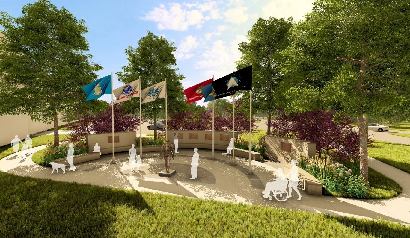 Aerial conceptual rendering of the Brentwood Veterans Monument plaza with military branch flags, a bronze soldier sculpture, curved honor walls, seating, and landscaping.