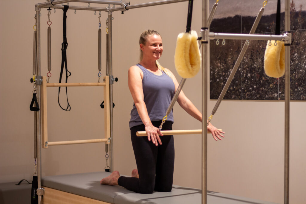Brooke Thomson leading a Pilates and wellness session at Pendulum Pilates and Wellness inside The Factory at Franklin, Tennessee.