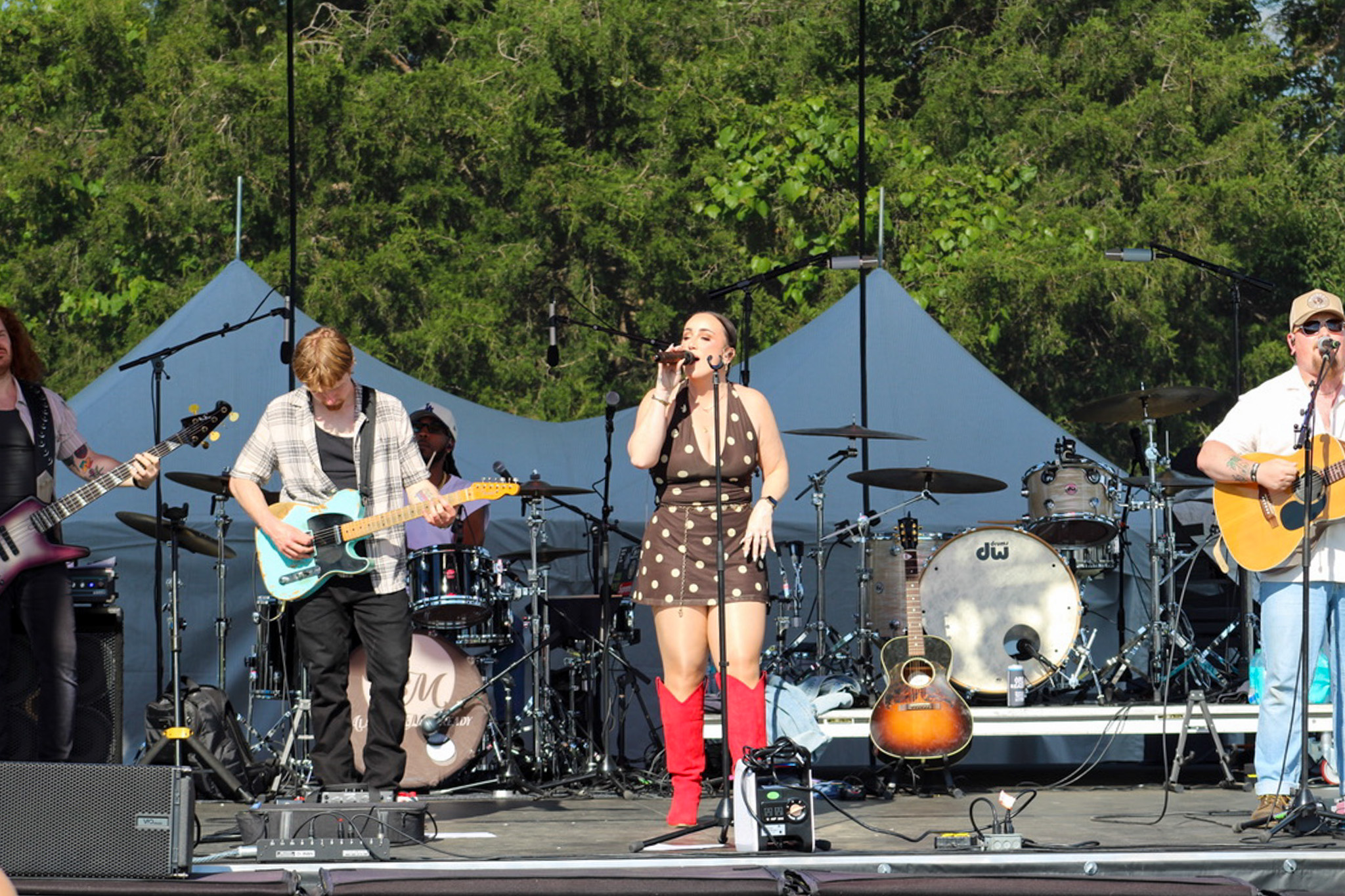 Iroquois Steeplechase Nashville live music performance by Alannah McCready on the race day stage.