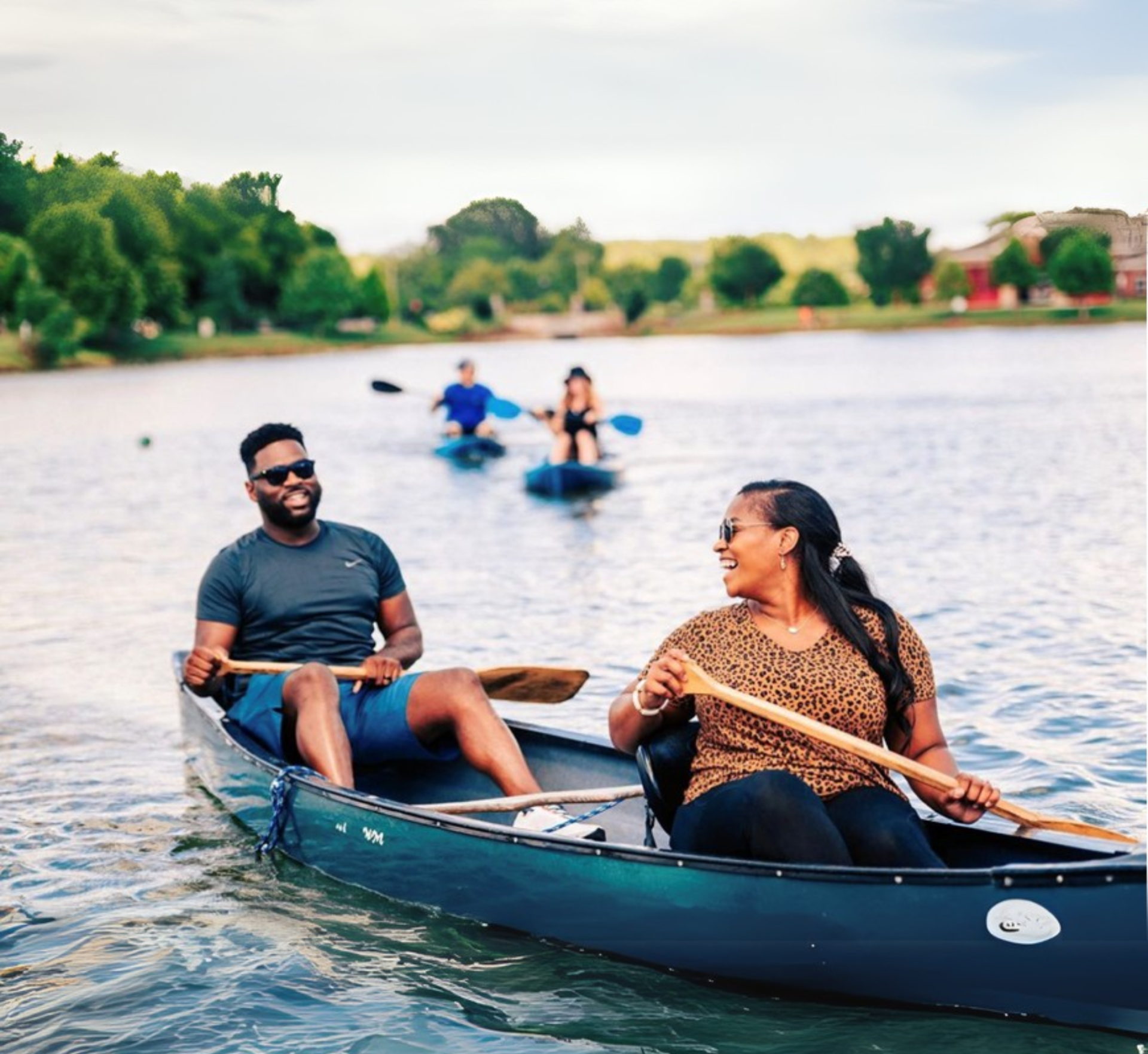 Visitors enjoying paddleboards, kayaks, and lakeside activities during the Paddle Dog season opening at Westhaven Lake in Franklin, Tennessee.