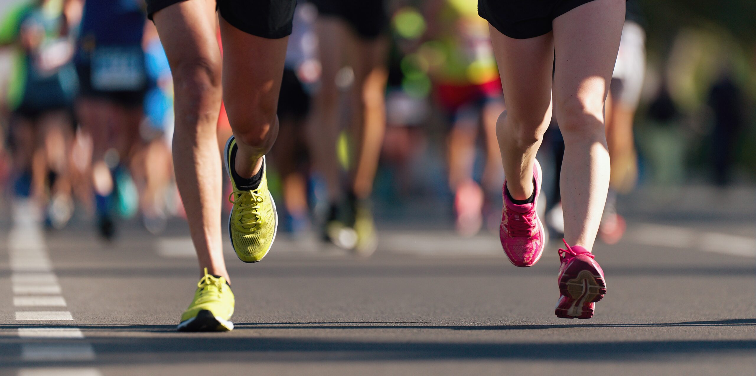 Runners participate in the YMCA Race Series, including the Andrews Cadillac Firecracker 5K in Brentwood and the East Nashville Tomato 5K in Nashville, TN